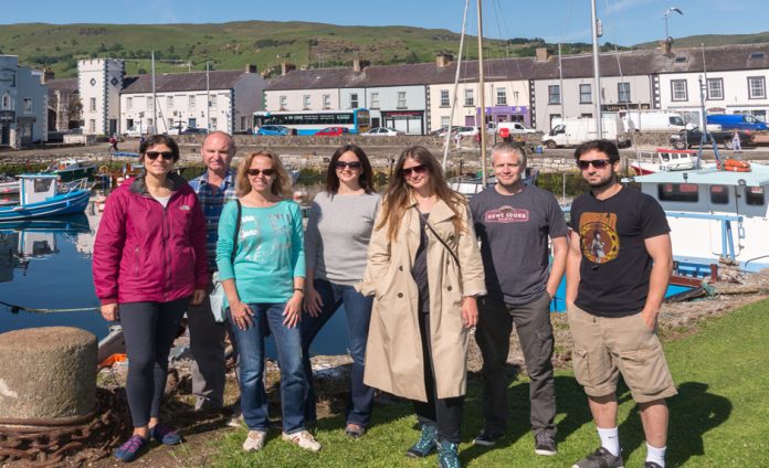 International travel journalists at the harbour in Carnlough – aka Braavos in Game of Thrones.