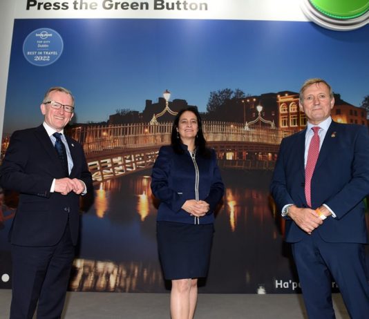 Niall Gibbons, Chief Executive of Tourism Ireland; Tourism Minister Catherine Martin; and Christopher Brooke, Vice-Chairman of Tourism Ireland, at World Travel Market in London.
