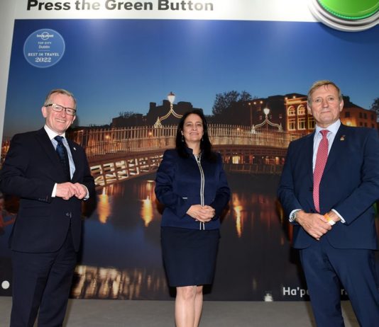 Niall Gibbons, Chief Executive of Tourism Ireland; Tourism Minister Catherine Martin; and Christopher Brooke, Vice-Chairman of Tourism Ireland, at World Travel Market in London.